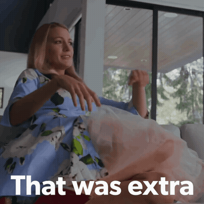 Woman Sitting On Couch With Extra Text GIF