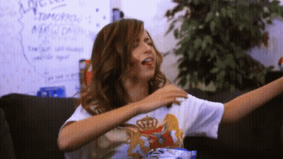 Woman Sitting On Couch With Motivational Quote GIF