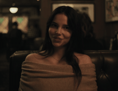 Woman Sitting On Couch With No On Chest GIF