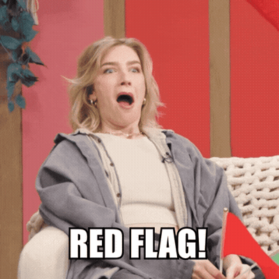 Woman Sitting On Couch With Open Mouth GIF