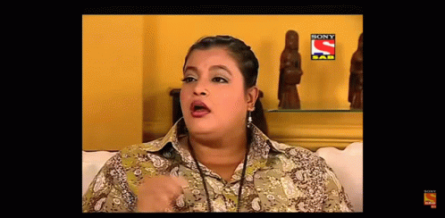 Woman Sitting On Couch With Sony Logo GIF