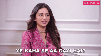 Woman Sitting On Couch Ye Kaha Se Aa Gayi Hai GIF