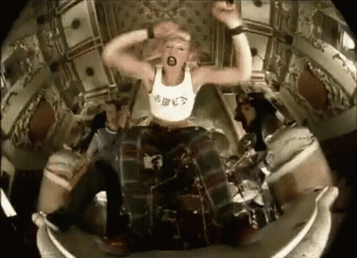 Woman Sitting On Drum Set GIF