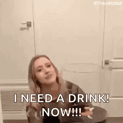 Woman Sitting On Floor Holding Wine Saying I Need A Drink Now GIF