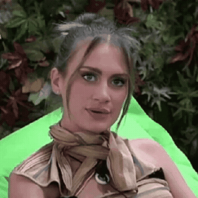 Woman Sitting On Green Bean Bag Chair GIF