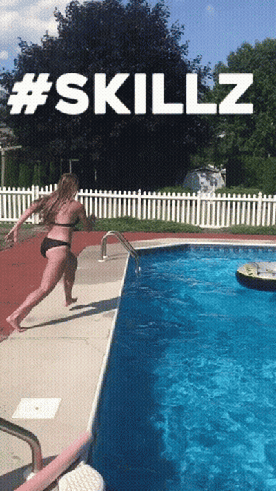 Woman Sitting On Inflatable Hippo In Pool GIF
