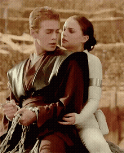 Woman Sitting On Man's Back Hugging GIF