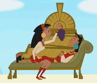 Woman Sitting On Man's Lap Holding Grape GIF