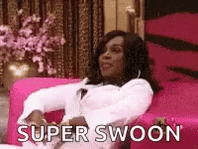 Woman Sitting On Pink Couch Saying Super Swoon GIF