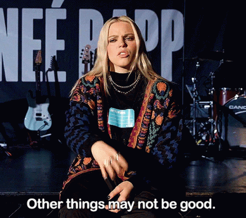 Woman Sitting On Stage With Words Other Things May Not Be Good GIF