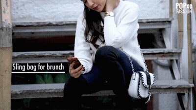 Woman Sitting On Stairs Looking At Phone Sling Bag For Brunch GIF