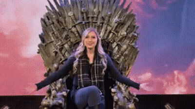 Woman Sitting On Throne Arms Outstretched GIF