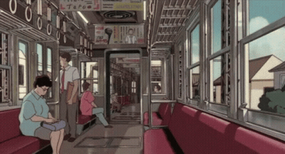 Woman Sitting On Train Looking At Phone GIF