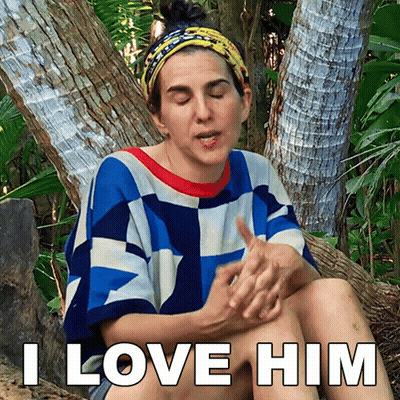 Woman Sitting On Tree Trunk Saying I Love Him GIF