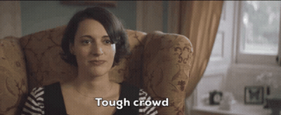 Woman Sitting Tough Crowd GIF