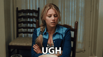 Woman Sitting With Arms Crossed Saying Ugh GIF