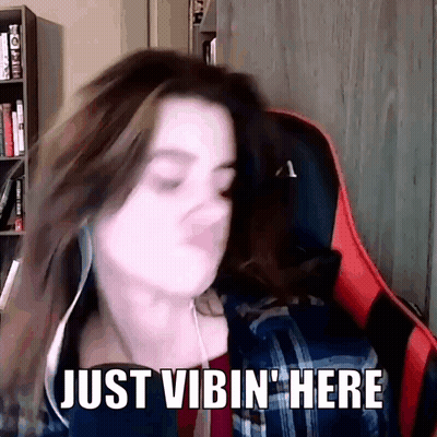 Woman Sitting With Headphones And Just Vibin Here GIF