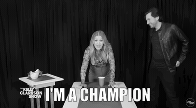 Woman Sitting With Im A Champion GIF