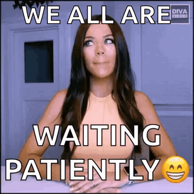 Woman Sitting With Smiley Saying We All Are Waiting Patiently GIF