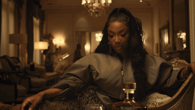 Woman Sitting With Stella Artois