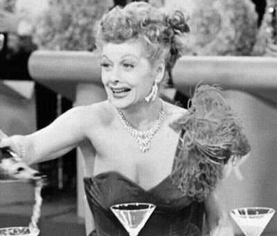 Woman Sitting With Three Martini Glasses GIF