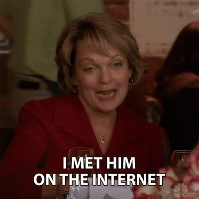 Woman Sitting With Wine Saying I Met Him on the Internet