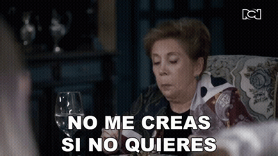 Woman Sitting With Wine Saying No Me Creas Si No Quieres GIF