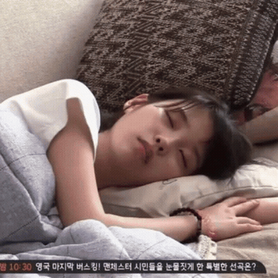 Woman Sleeping On Bed At 10:30 GIF