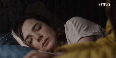 Woman Sleeping Under Netflix Logo GIF