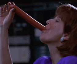 Woman Slurping Sausage  GIF