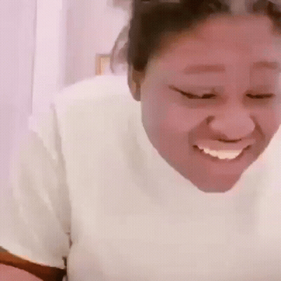 Woman Smiling And Making Funny Face GIF