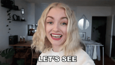 Woman Smiling And Saying Lets See GIF