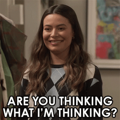 Woman Smiling Asking If She Is Thinking What She Is Thinking