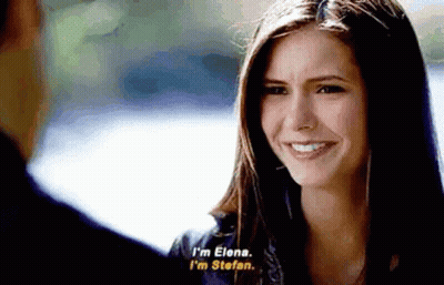 Woman Smiling At Man Saying I'm Elena I'm Stefano GIF