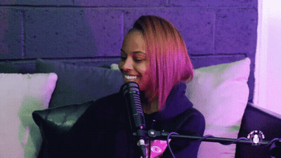Woman Smiling At Microphone GIF