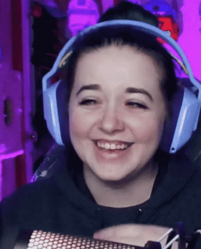 Woman Smiling Blue Headphones Purple Background GIF