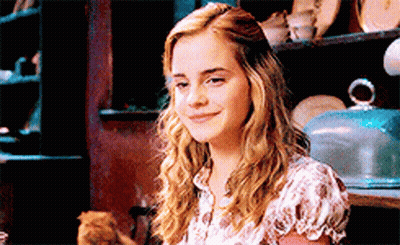 Woman Smiling Holding Cat In Lap GIF