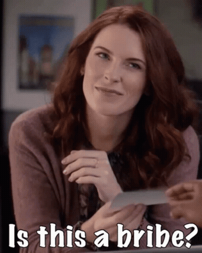 Woman Smiling Holding Paper Saying Is This A Bribe GIF