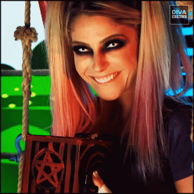 Woman Smiling Holding Pentagram Box In Front Of Diva Banner GIF