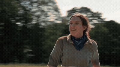 Woman Smiling In Field With Bandana GIF
