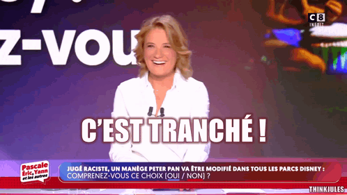 Woman Smiling In Front Of Cest Tranche Screen GIF
