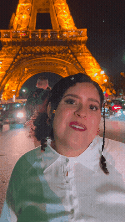 Woman Smiling In Front Of Eiffel Tower GIF