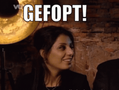 Woman Smiling In Front Of Gefopt Sign GIF