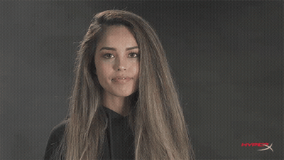 Woman Smiling In Front Of Hyper X Logo GIF