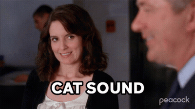 Woman Smiling In Front Of Man With Cat Sound GIF