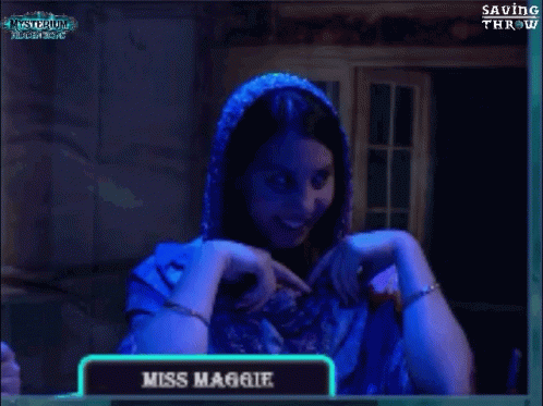 Woman Smiling In Front Of Miss Maggie Screen GIF