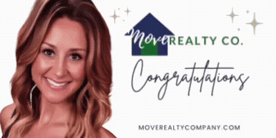 Woman Smiling In Front Of Move Realty Co Congratulations Sign GIF