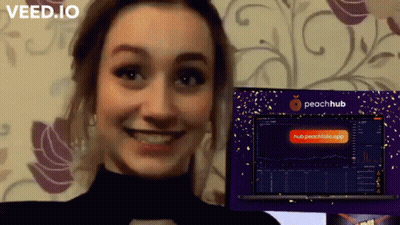 Woman Smiling In Front Of Peachhub Advertisement GIF