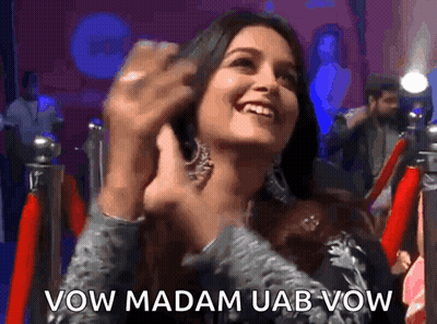 Woman Smiling In Front Of Red Carpet Saying Vow Madam Uab Vow GIF