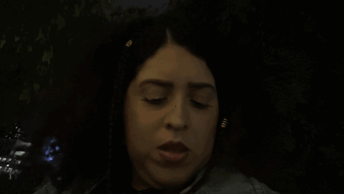 Woman Smiling In Front Of Shagarita Sign GIF